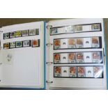 Stamps; two folders with Guernsey commemoratives and gutter-pairs