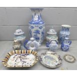 A collection of oriental style china including a pair of lidded vases **PLEASE NOTE THIS LOT IS