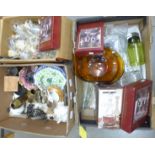 Two boxes of glass and a box of assorted items; two brass vases, sea shells, tourist souvenirs, cast