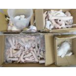 A box of mixed ceramic doll parts, heads, arms, legs and bodies **PLEASE NOTE THIS LOT IS NOT