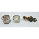 Two silver napkin rings, including one pierced marked BPDC, Boots Pure Drug Company, 58g, and a wine