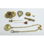 A collection of Victorian jewellery including a pinchbeck purple stone set brooch, a citrine