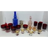 A seven piece peach glass liqueur set, a NASA Kennedy Space Centre souvenir glass tankard and shot