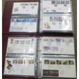 Stamps:- Great Britain First Day Covers from the 1990 - 2005 period, in two Royal Mail First Day