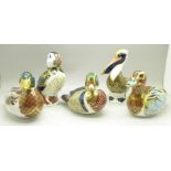 Five Royal Crown Derby paperweights; Collectors Guild duck with gold stopper and four others with
