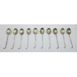 A set of ten silver golf club coffee spoons, Birmingham hallmarks, 53g
