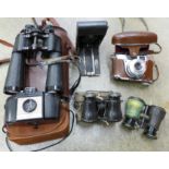 A pair of Lieberman & Gortz 20x40 binoculars, two pairs of opera glasses and a collection of cameras