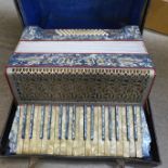 A German Pietro accordion, cased