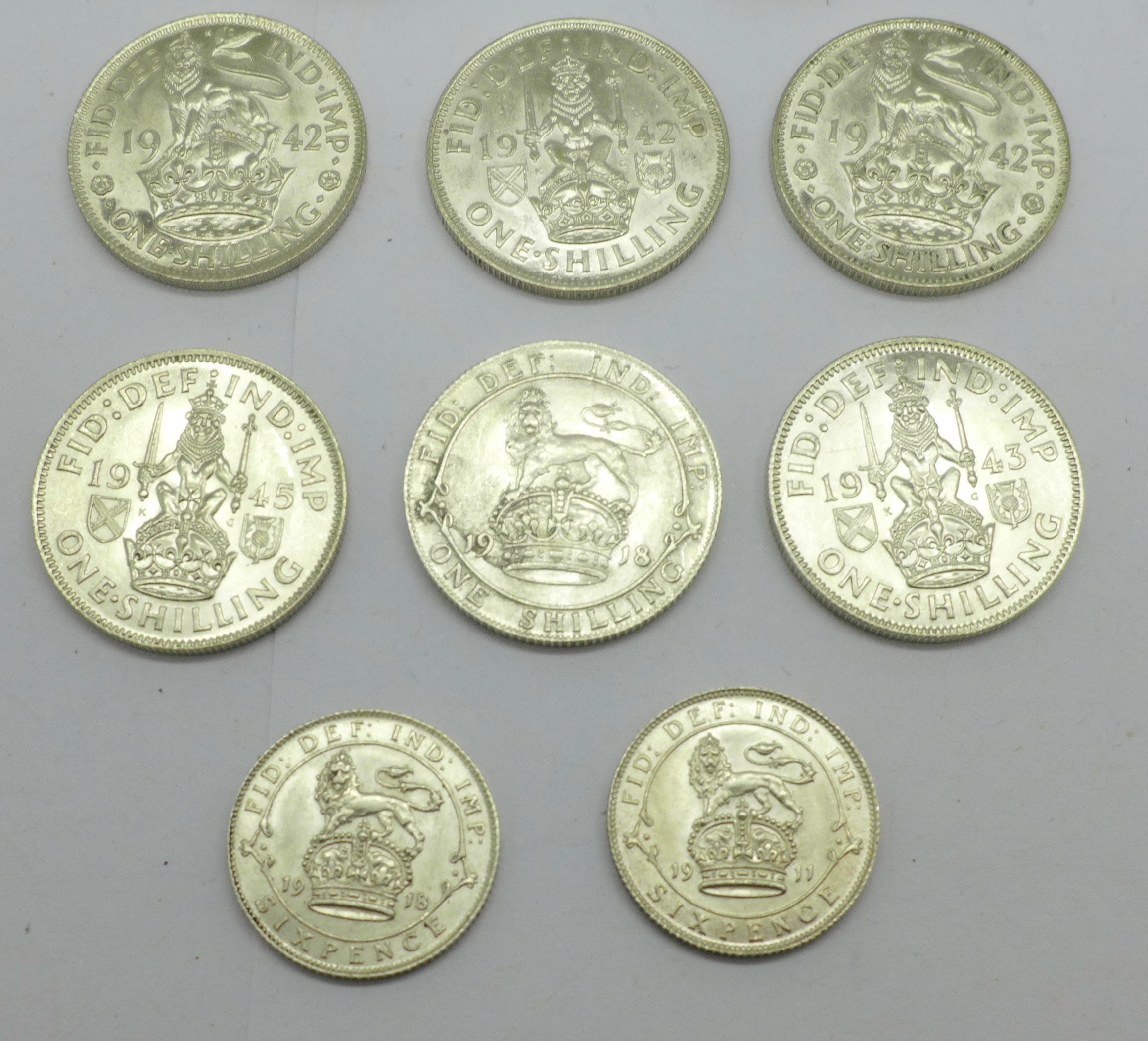 Eight one shilling coins;- 1918, 2x 1926, 3x 1942, 1943 and 1945, and two sixpence coins, 1911 and - Image 3 of 4