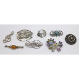 Eight silver brooches including two Arts and Crafts style
