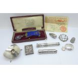 A silver pill box, a propelling pencil holder, a small Danish candlestick, a filigree box, a