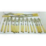 A set of twelve silver plated fish knives and forks with silver ferrules, plus servers, two forks