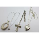 Three silver pendants and chains including a mother of pearl and marcasite cross pendant, 36g, cross