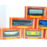 Twelve Hornby Railways 00 gauge model wagons; BP, Shell, Harvester, etc., boxed