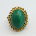 A 9ct gold, oval malachite set ring, 5.4g, M, stone 16mm x 12mm