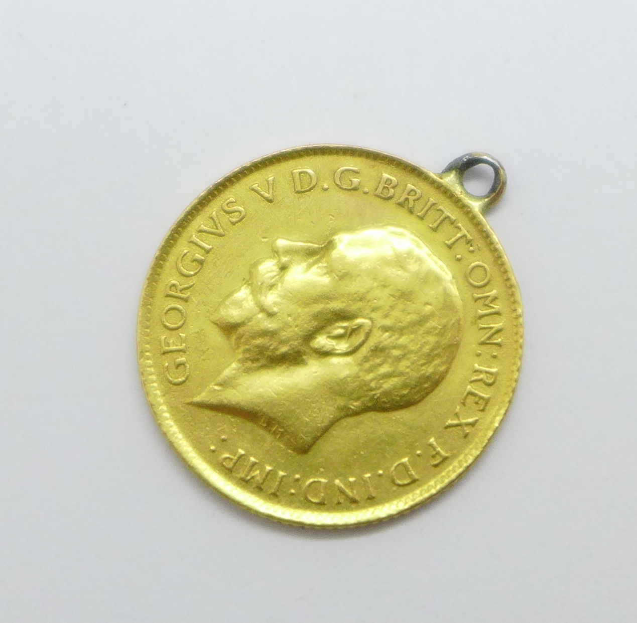 A George V 1913 half-sovereign with attached loop, a/f - Image 2 of 2