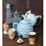 A Royal Doulton Bootmaker character jug, two teapots, Ye Daintee Ladyee Teapot and a Tony Wood