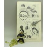 Beatles jewellery; a Beatles pendant and chain and a Tack Pin set