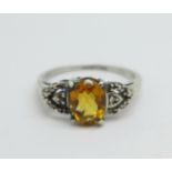 A 9ct white gold and citrine ring with diamond shoulders, 2.9g, S