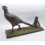 A cold painted pewter table lighter in the form of a pheasant, beak a/f, 30.5cm