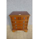 A small yew wood chest of drawers