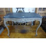 A French Louis XV style painted serpentine single drawer writing table