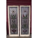 A set of four Arts and Crafts stained glass windows