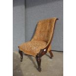 A Victorian upholstered rosewood lady's chair
