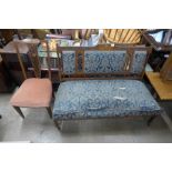 An Edward VII inlaid rosewood and upholstered salon settee and a chair