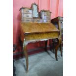 A Victorian burr walnut and marquetry inlaid bonheur de jour