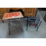 A Victorian tiled top bamboo occasional table and a newspaper stand