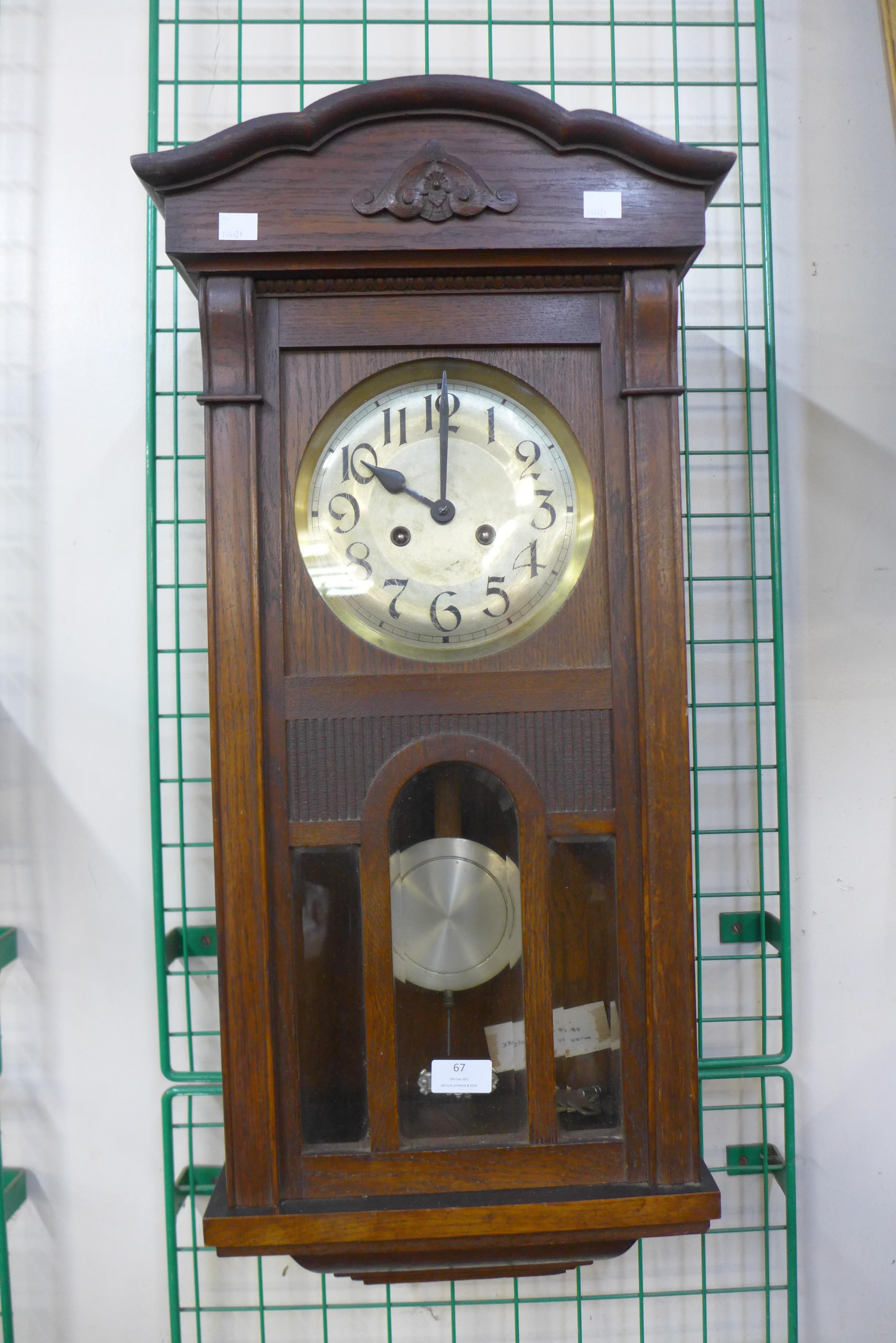An oak wall clock