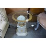 An Italian style marble, gilt metal and glass topped table