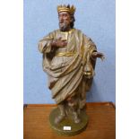 A continental carved wood polychrome ecclesiastical figure of a king, 64cms h