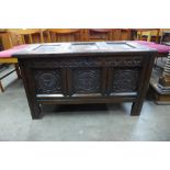 A Charles II carved oak coffer