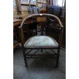 An Arts and Crafts inlaid mahogany elbow chair