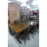 An oak refectory table and five beech wheelback chairs