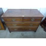 A Victorian walnut chest of drawers, made by Rumney & Love, Liverpool