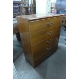 A simulated teak chest of drawers