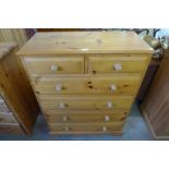 A pine chest of drawers