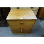 A Meredew teak bedside chest