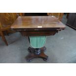 A William IV rosewood fold over sewing and games table