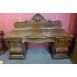 A Victorian mahogany pedestal serving table