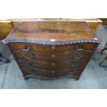 A Chippendale Revival carved mahogany serpentine chest of drawers, 80cms h, 96cms w, 46cms d