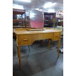 A sycamore veneered dressing table