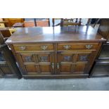 A Victorian carved walnut dresser