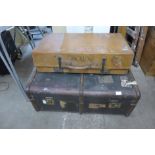 Two early 20th Century suitcases and a steamer trunk