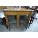 An Edward VII mahogany corner cabinet, a/f, and a mahogany butlers tray on folding stand