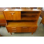 A teak highboard