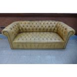 A caramel leather Chesterfield settee